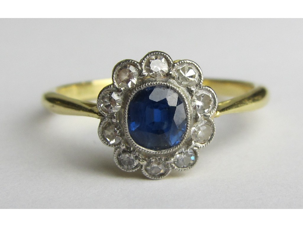 Appraisal: Nineteen thirties ct gold sapphire and diamond cluster ring with