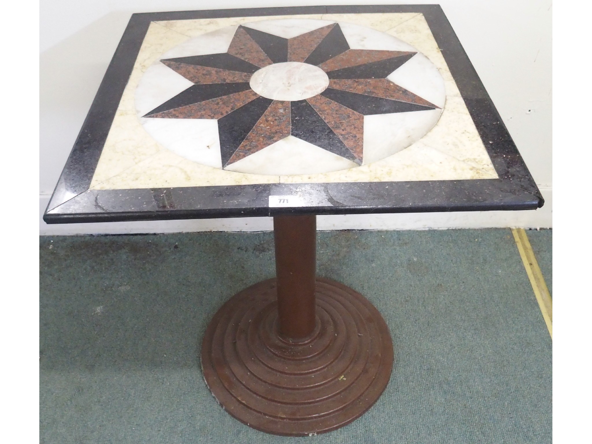 Appraisal: A square topped inlaid marble table on a round metal