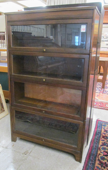 Appraisal: STACKING WALNUT BOOKCASE Grand Rapids c s having four stacking