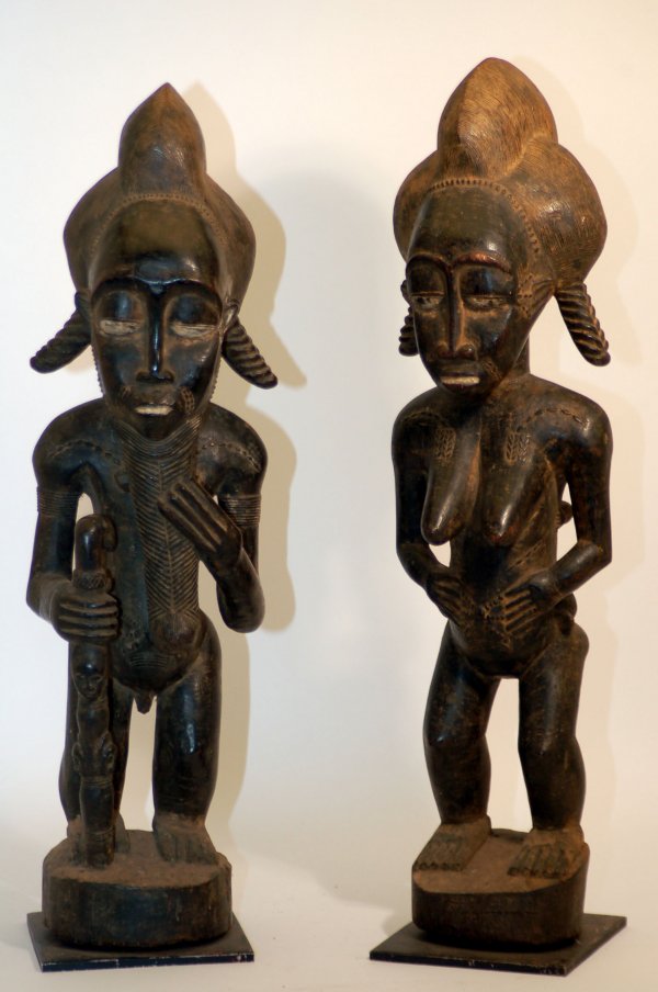 Appraisal: Baule Blolo Bla female and Blolo Bian male figures representing