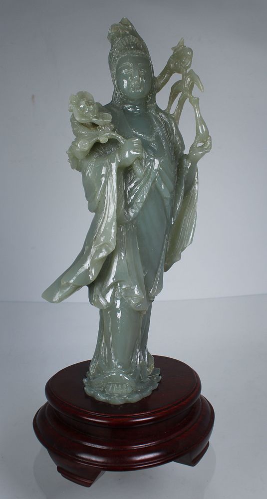 Appraisal: Chinese Carved Jade Guanyin on Wood Stand Chinese Carved Jade