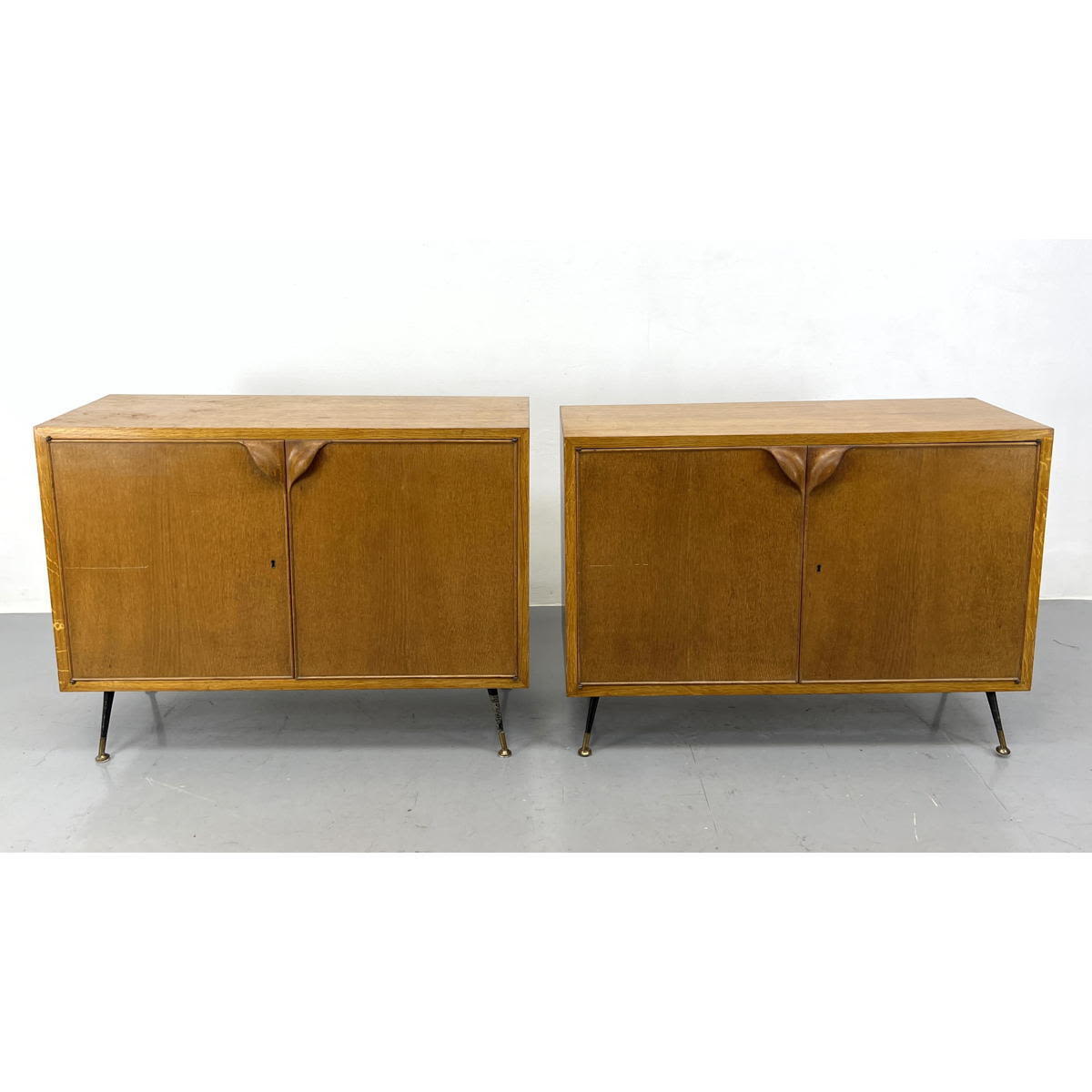 Appraisal: Pair of Italian 's light wood credenza Servers Natural form