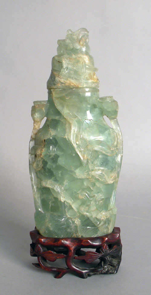 Appraisal: Chinese carved green quartz urn h together with a table