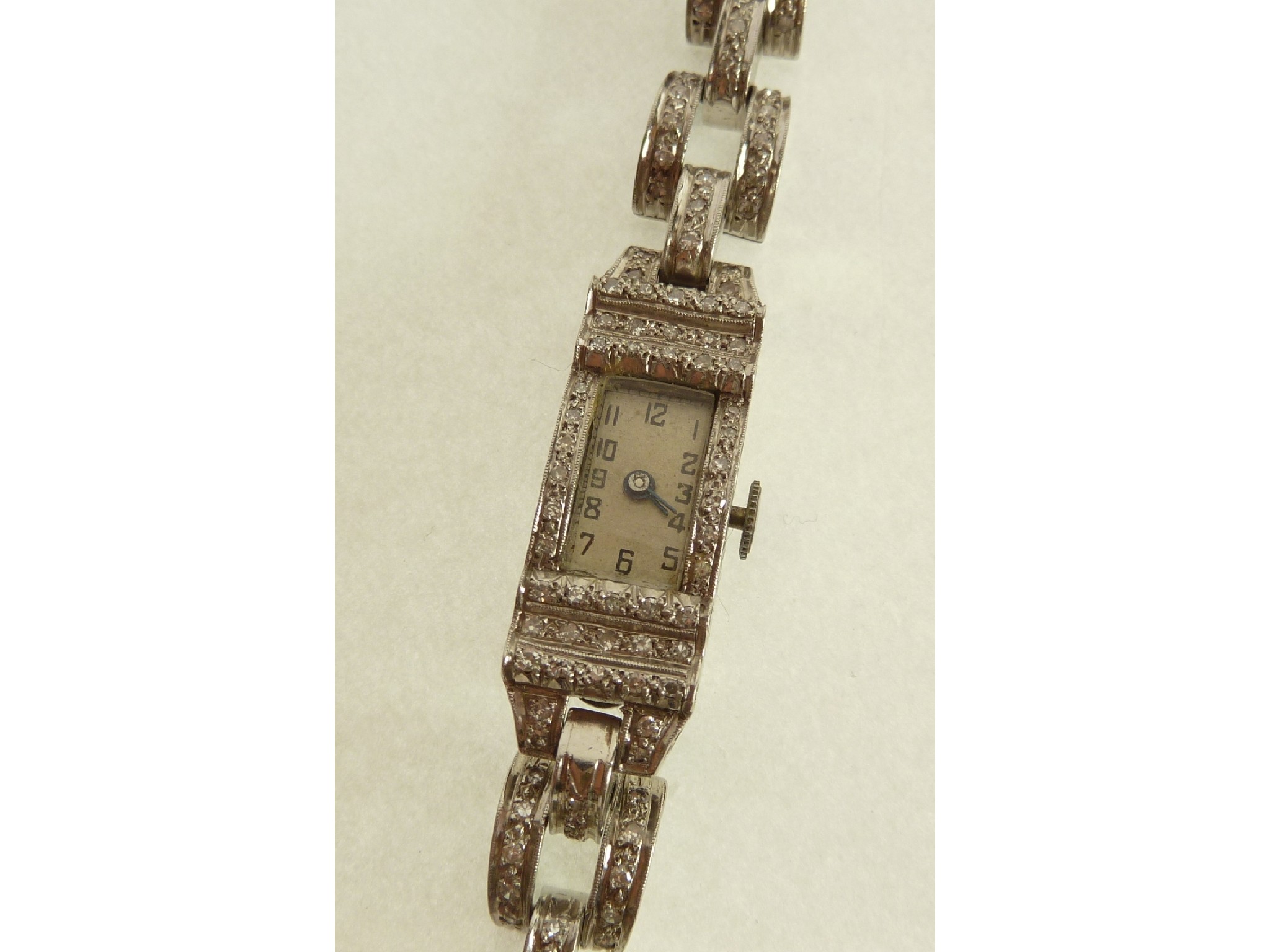 Appraisal: A LADY'S CT WHITE GOLD AND DIAMOND BUCHERER SWISS COCKTAIL