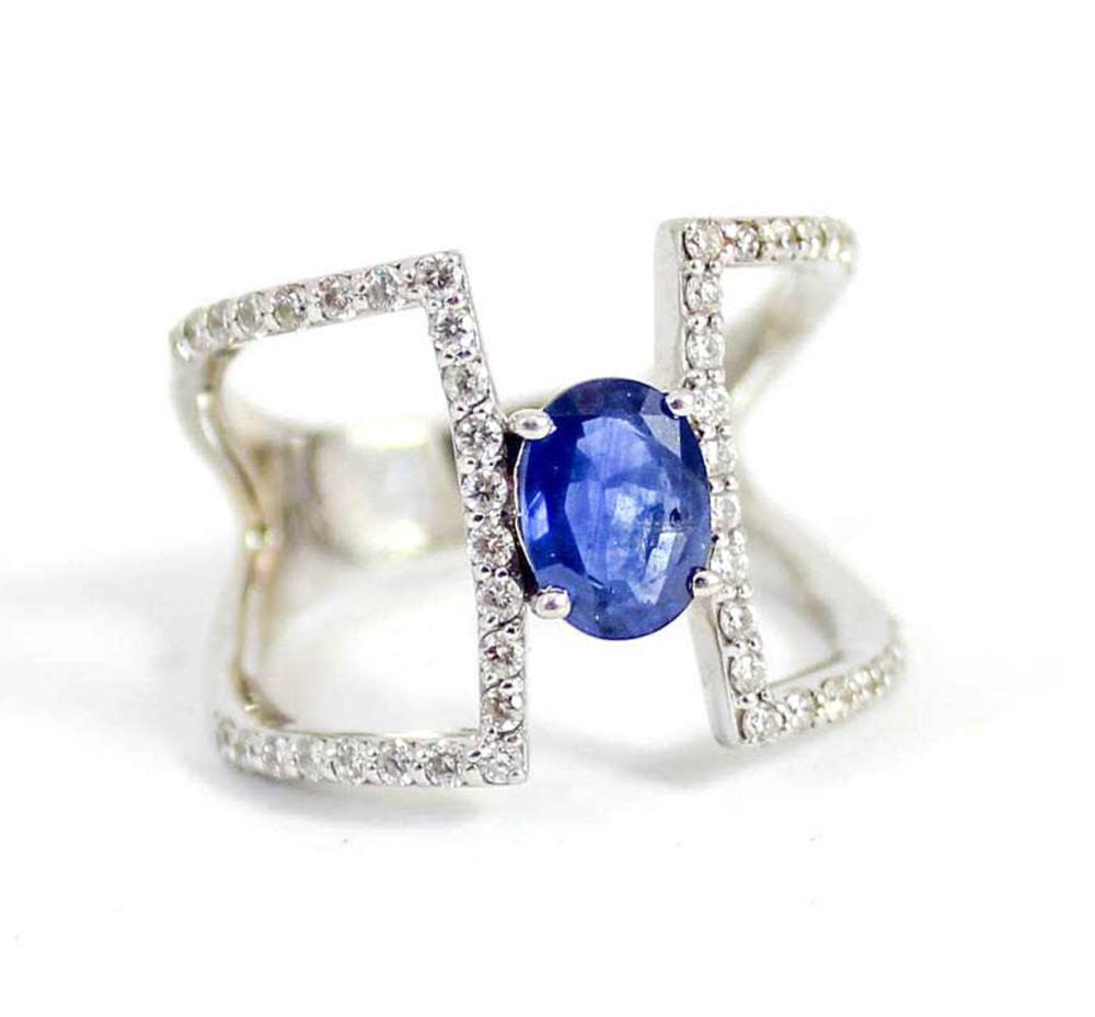 Appraisal: SAPPHIRE DIAMOND AND FOURTEEN KARAT GOLD RING The k white