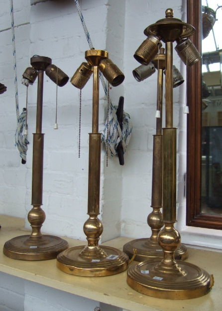 Appraisal: Two pairs of gilt brass table lamps early th century