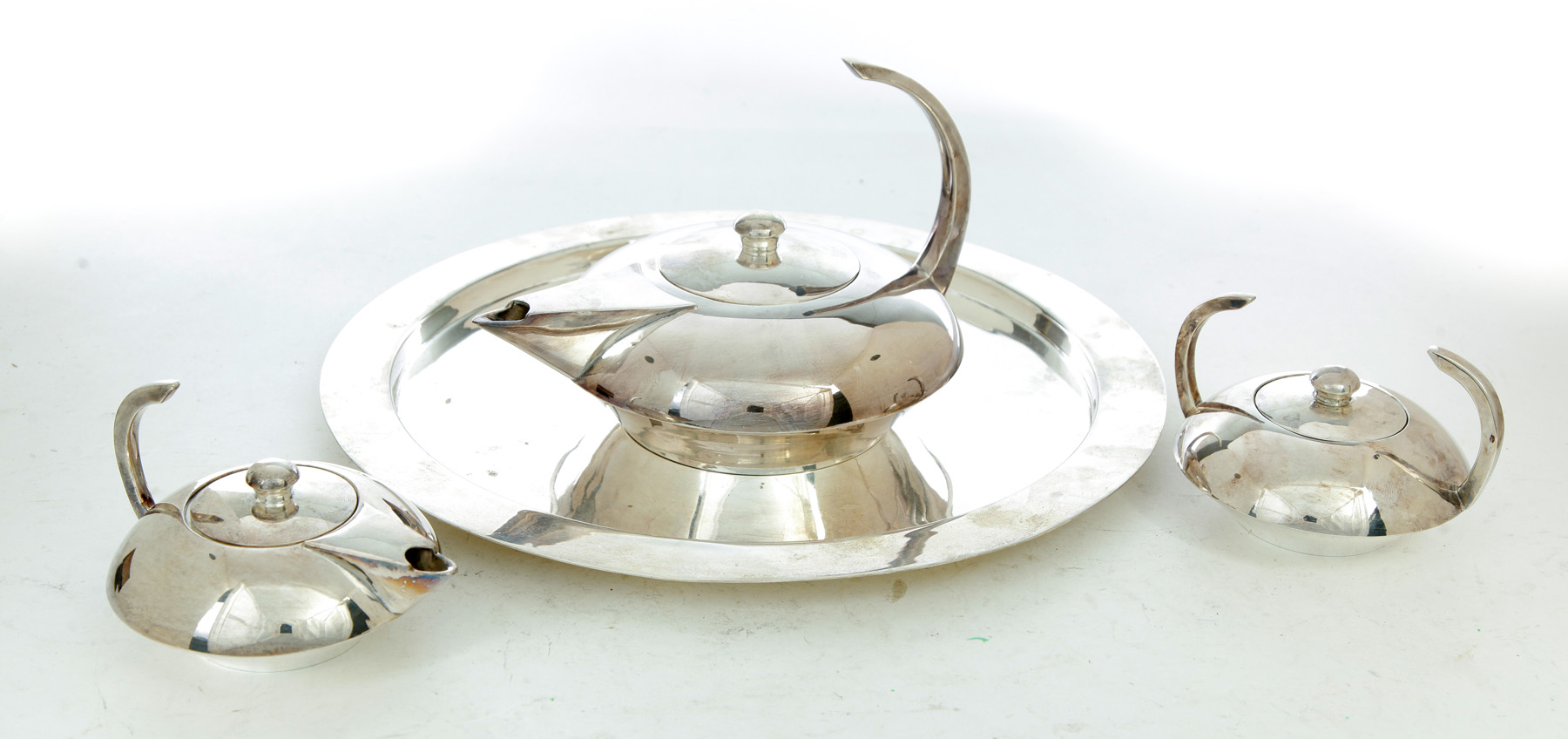 Appraisal: MODERN FOUR-PIECE CHROME TEASET ESCAPADE France Retro Art Deco teapot