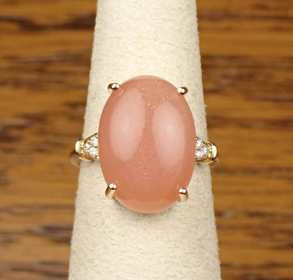 Appraisal: PEACH CAT'S EYE MOONSTONE AND DIAMOND RING The k yellow