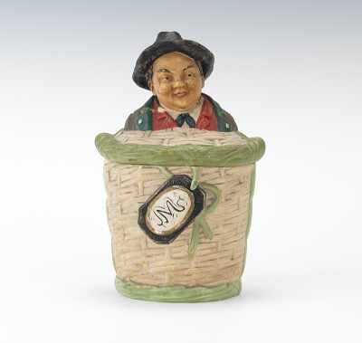 Appraisal: Johann Maresch Composite Figural Tobacco Jar of Alpine Man Basket