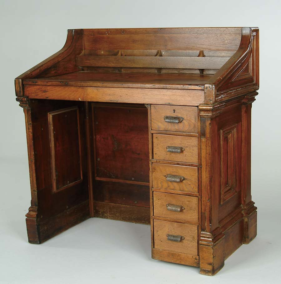 Appraisal: INTERESTING ANTIQUE WALNUT DESK Single bank having five drawers with