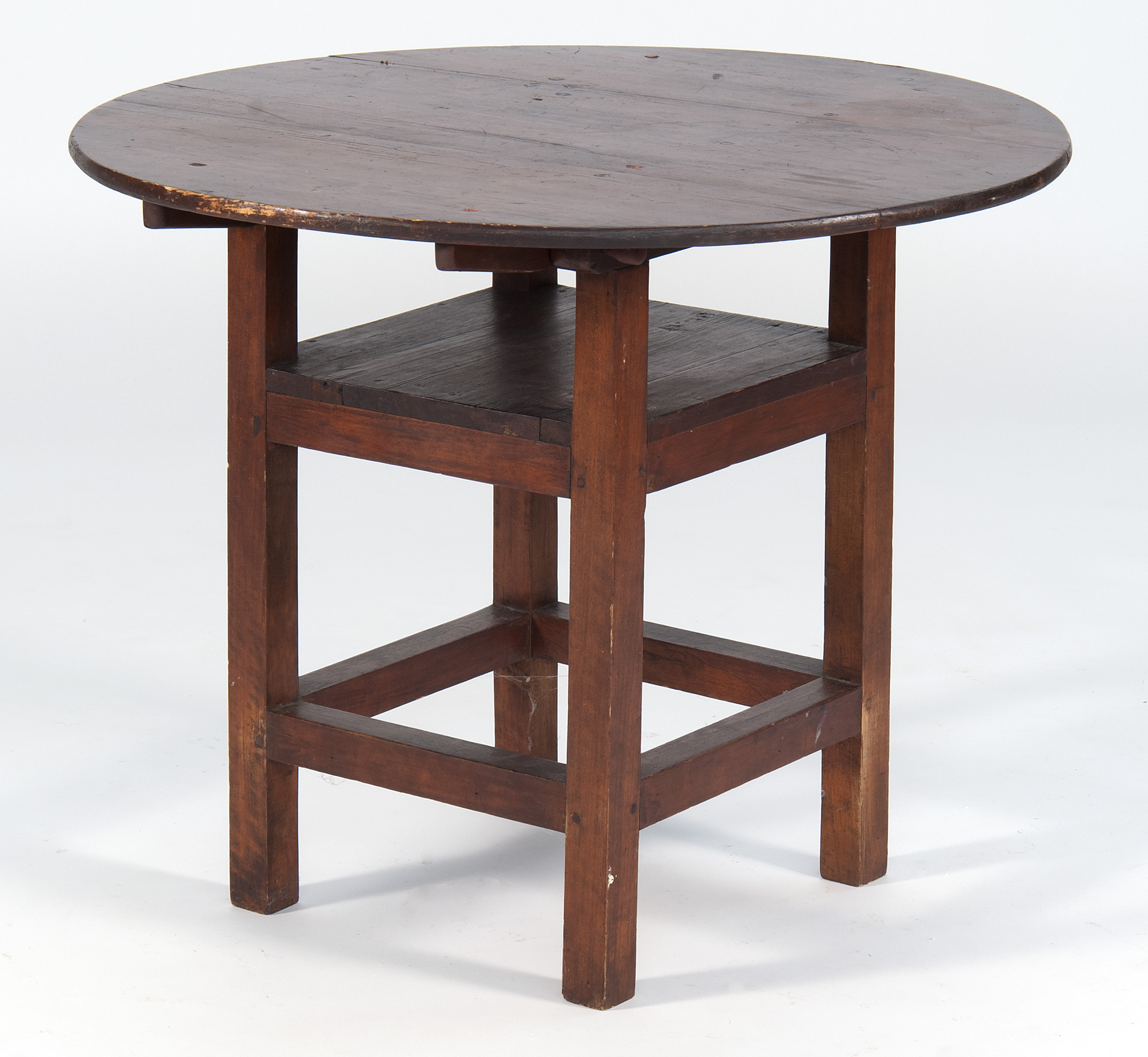 Appraisal: HUTCH TABLE th CenturyIn pine with reddish-brown stain Height Diameter