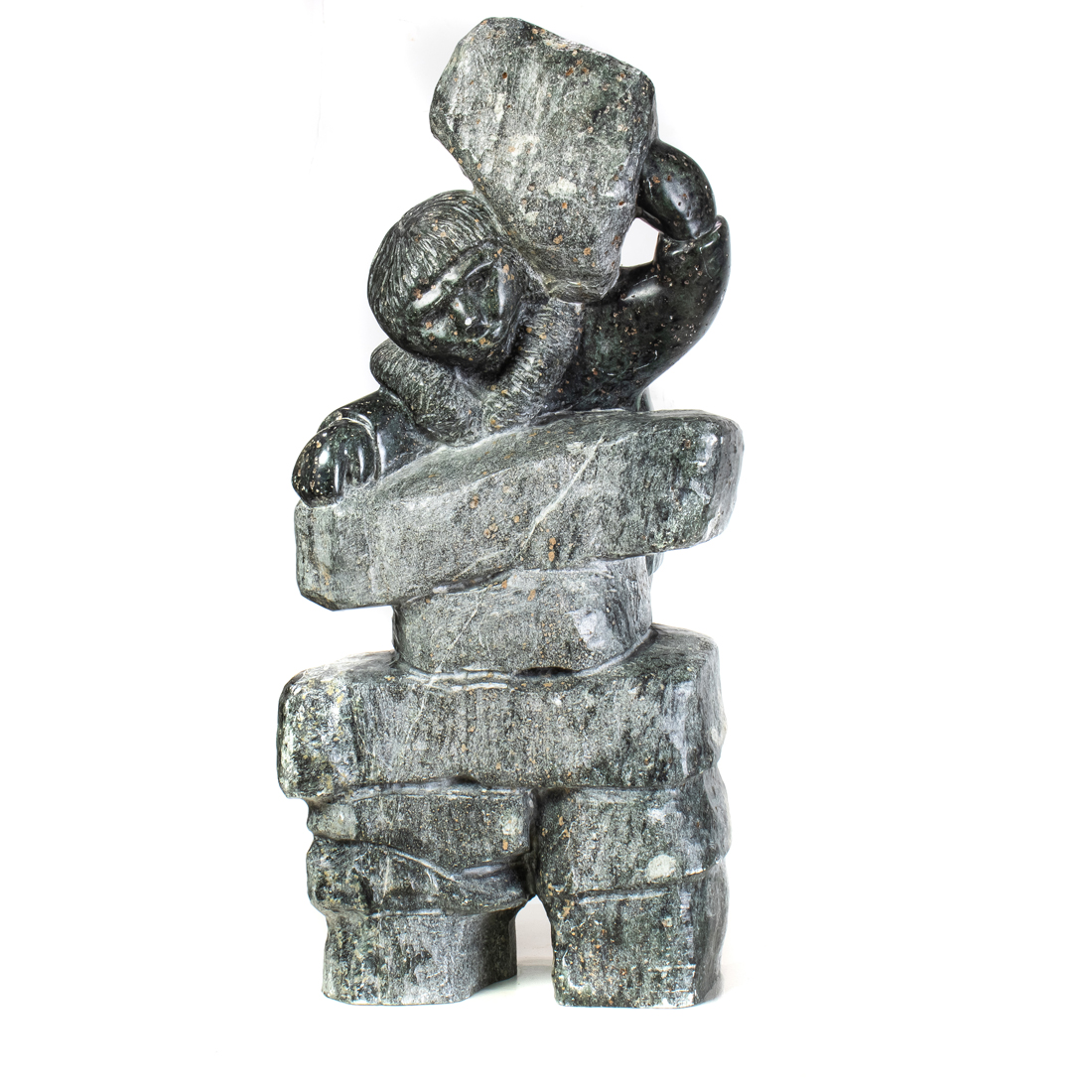 Appraisal: AN INUIT SOAPSTONE FIGURE OF A MAN CLIMBING An Inuit