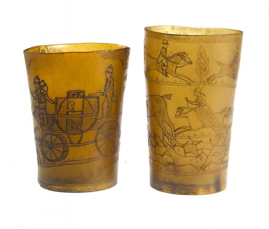 Appraisal: TWO HORN BEAKERS one incised with a scene of the