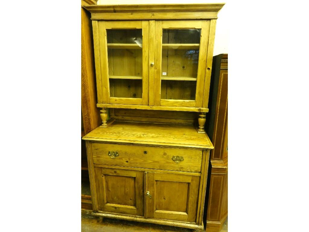 Appraisal: A European stripped and waxed pine kitchen dresser the upper