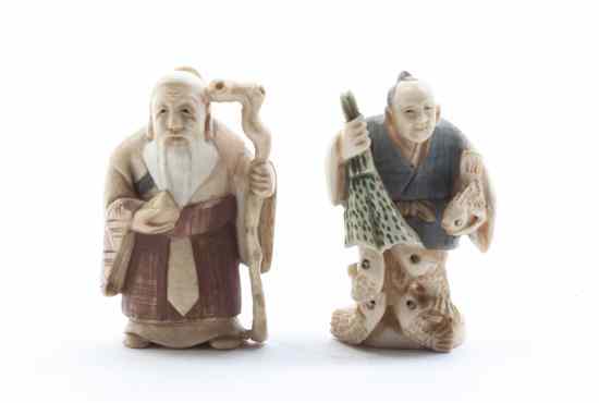 Appraisal: Two Stained Ivory Netsukes Koshin the first depicting a scholar