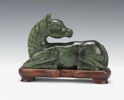 Appraisal: A Carved Spinach Jade Horse The horse carved looking back