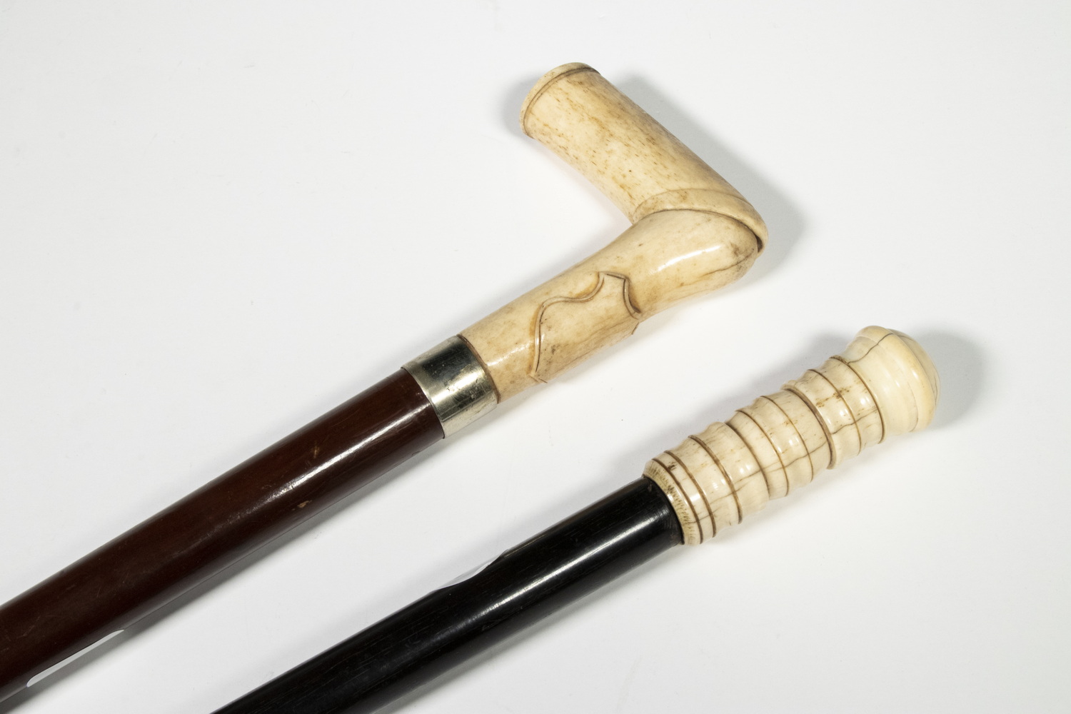 Appraisal: TH C IVORY TOPPED WALKING STICKS Gent's Evening Sticks including