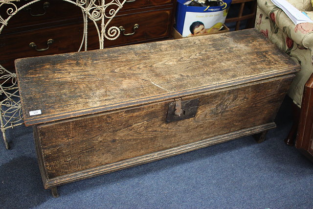 Appraisal: A TH TH CENTURY ELM PLANK COFFER carved and moulded