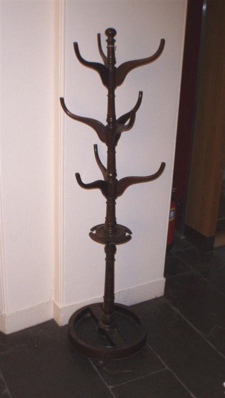 Appraisal: A late Victorian stained oak coat stand with three tiers