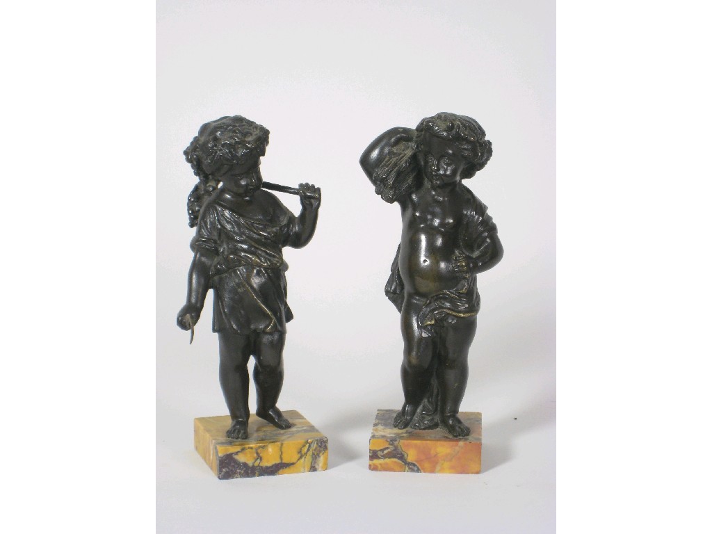 Appraisal: Pair of bronze Figures of Children on marble bases in