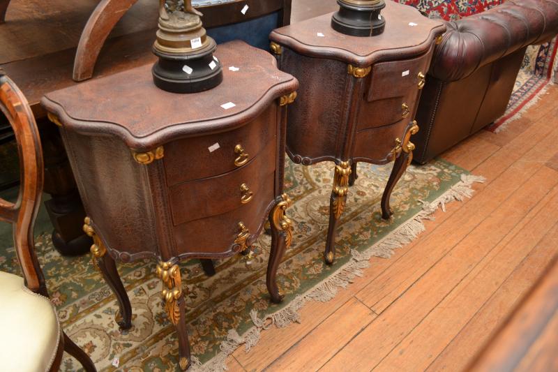 Appraisal: A PAIR OF CONTINENTAL STYLE THREE DRAWER BEDSIDES A PAIR