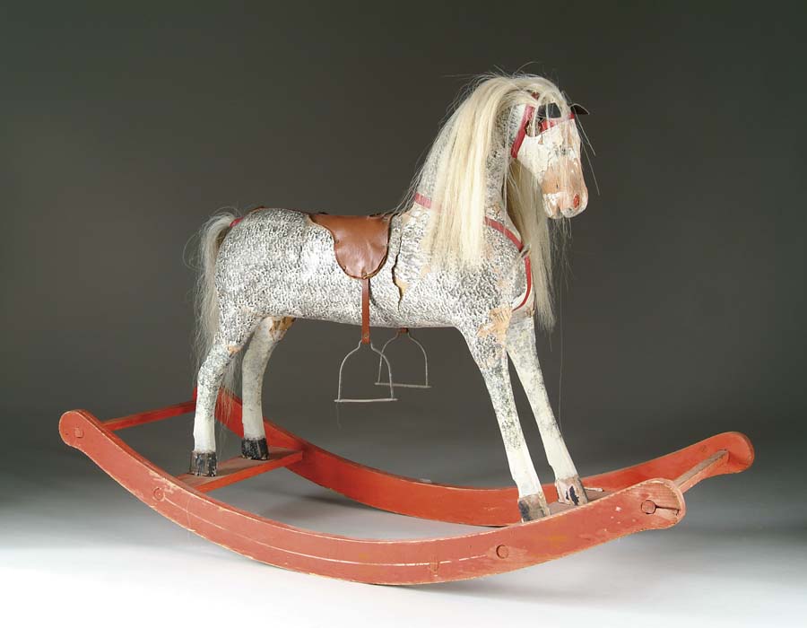 Appraisal: GERMAN ROCKING HORSE Wooden framed horse covered in paper and