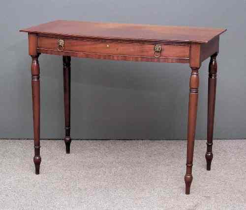 Appraisal: A late Georgian mahogany bow-front side table the top with