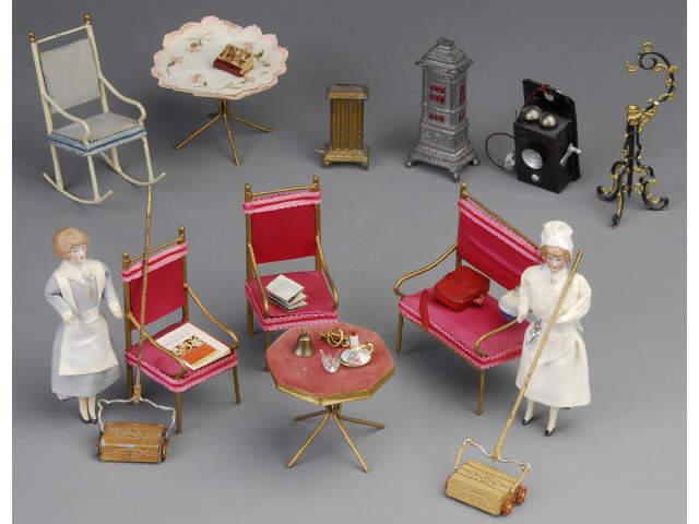 Appraisal: Dollhouse Maids and Painted Metal Furniture MN A pair of