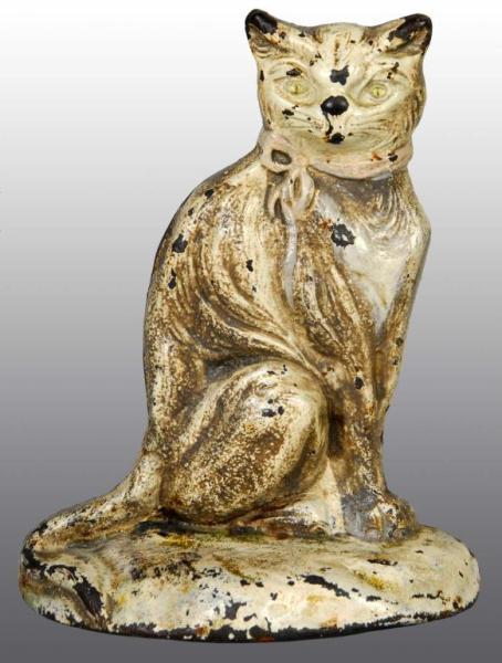 Appraisal: Cast Iron Sitting Cat Doorstop Description Made by Johnson Depicts