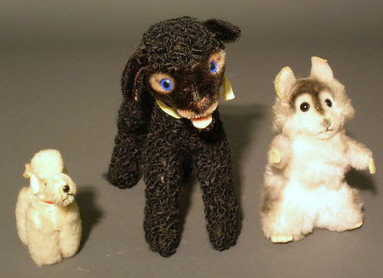 Appraisal: Three Steiff animals- Persian lamb h two poodles h each