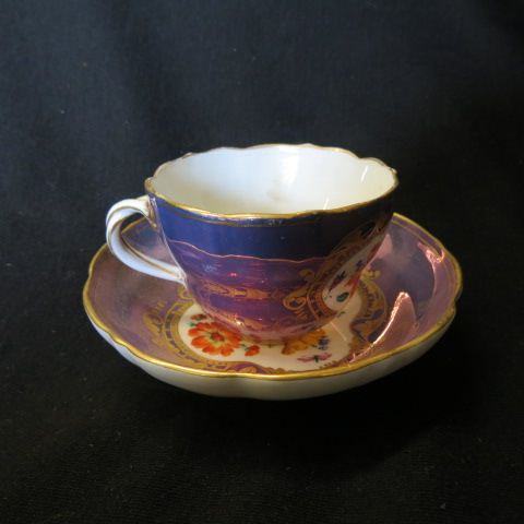 Appraisal: Meissen Porcelain Cup Saucer handpainted floral luster finish crossed swords