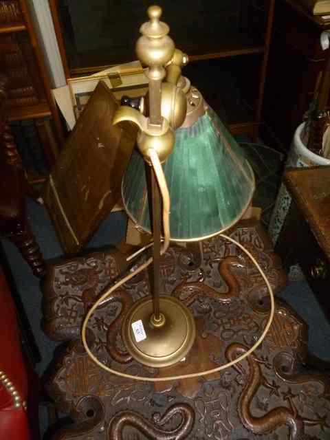 Appraisal: AN ANTIQUE ADJUSTABLE BRASS TABLE LAMP with green shade high