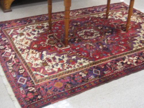 Appraisal: PERSIAN GERAVAN OR HERIZ CARPET Azerbaijan province central geometric and