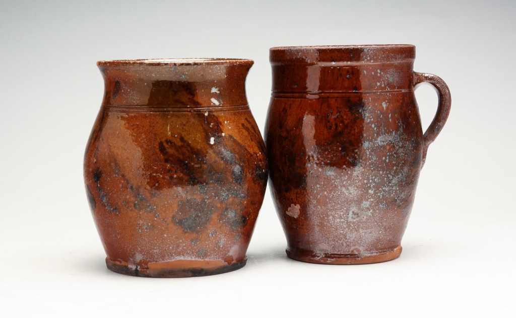 Appraisal: TWO AMERICAN REDWARE JARS Mid th century Apple butter jars