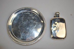 Appraisal: An Edwardian silver hip-flask James Dixon Sons Sheffield to w