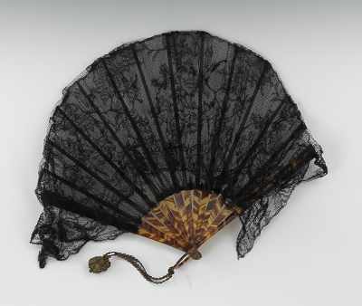 Appraisal: A Black Hand Made Lace Hand Fan With shaped faux