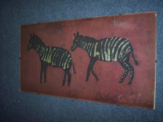 Appraisal: Ghitani NjorogeZebra's in redsignedwatercolour batik cm x cm x