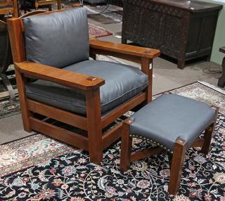 Appraisal: L J G Stickley Audi Eastwood chair and footstool L