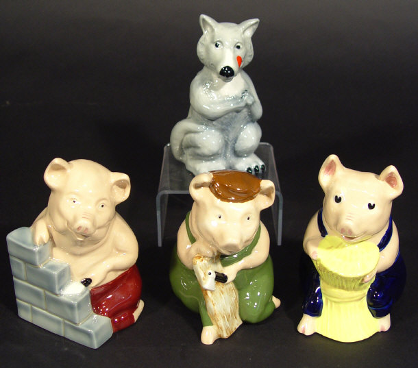 Appraisal: Set of four Wade Collectors Club little three pigs and