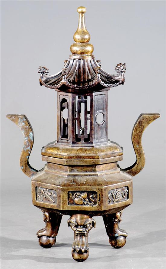 Appraisal: Chinese gilt-bronze censer form of pagoda raised on paw feet