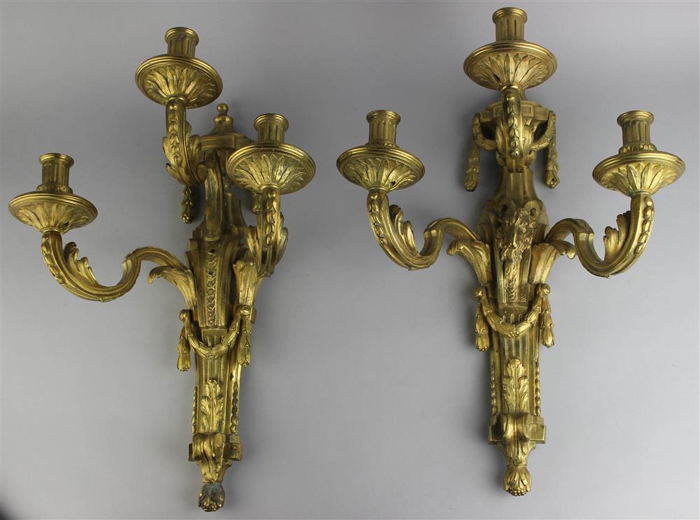 Appraisal: PAIR OF LOUIS XVI STYLE GILT BRONZE THREE-LIGHT WALL LIGHTS