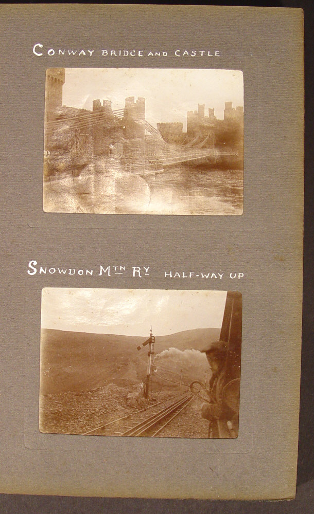 Appraisal: Edwardian album of black and white photographs including shipping and