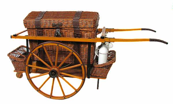 Appraisal: A wicker work drinkers cart height in width ft in