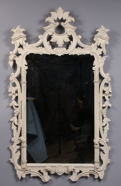 Appraisal: Mirror in carved wooden frame h x w overframe dimensions