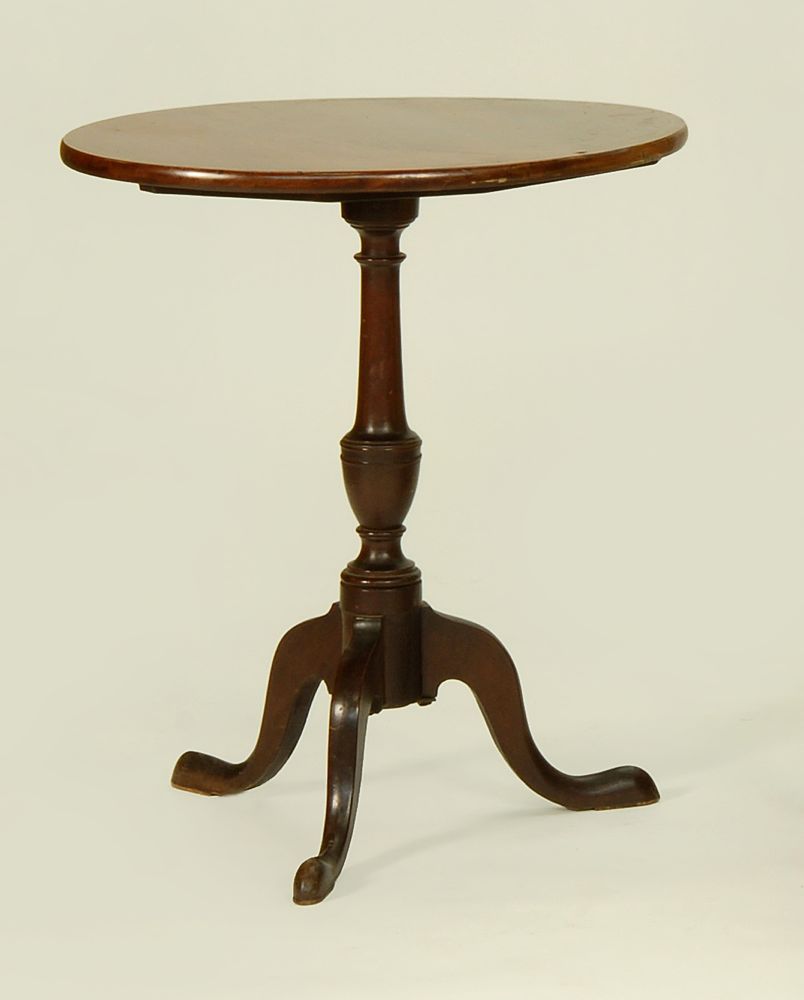 Appraisal: ANTIQUE AMERICAN CANDLESTAND th CenturyIn mahogany with oval line-inlaid top