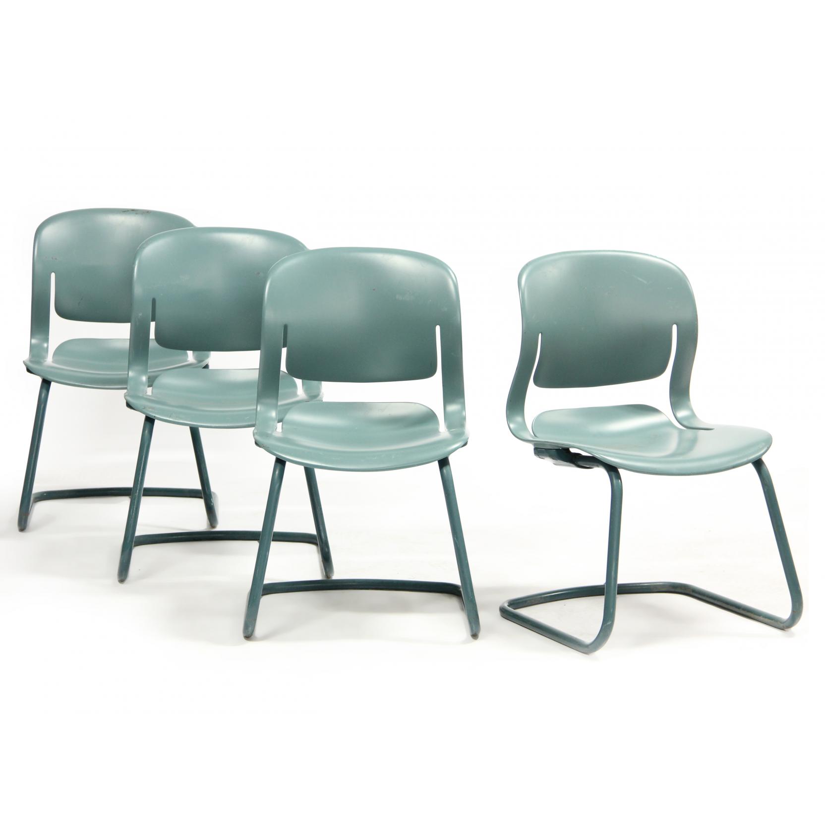 Appraisal: Four Herman Miller Equa Chairs aquamarine shell seat tubular metal