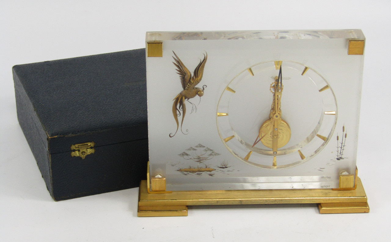 Appraisal: A Jaegar le Coutre Marina clock in perspex and burnished