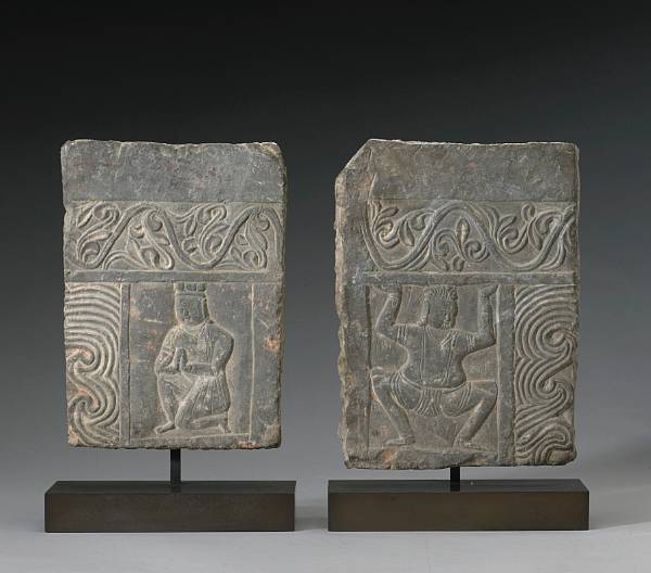 Appraisal: Two carved stone fragments Northern Qi Tang Dynasty Of thinly