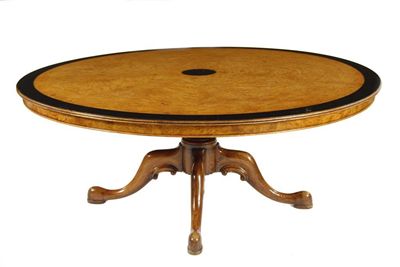 Appraisal: A bird's eye maple centre table the circular reeded edge