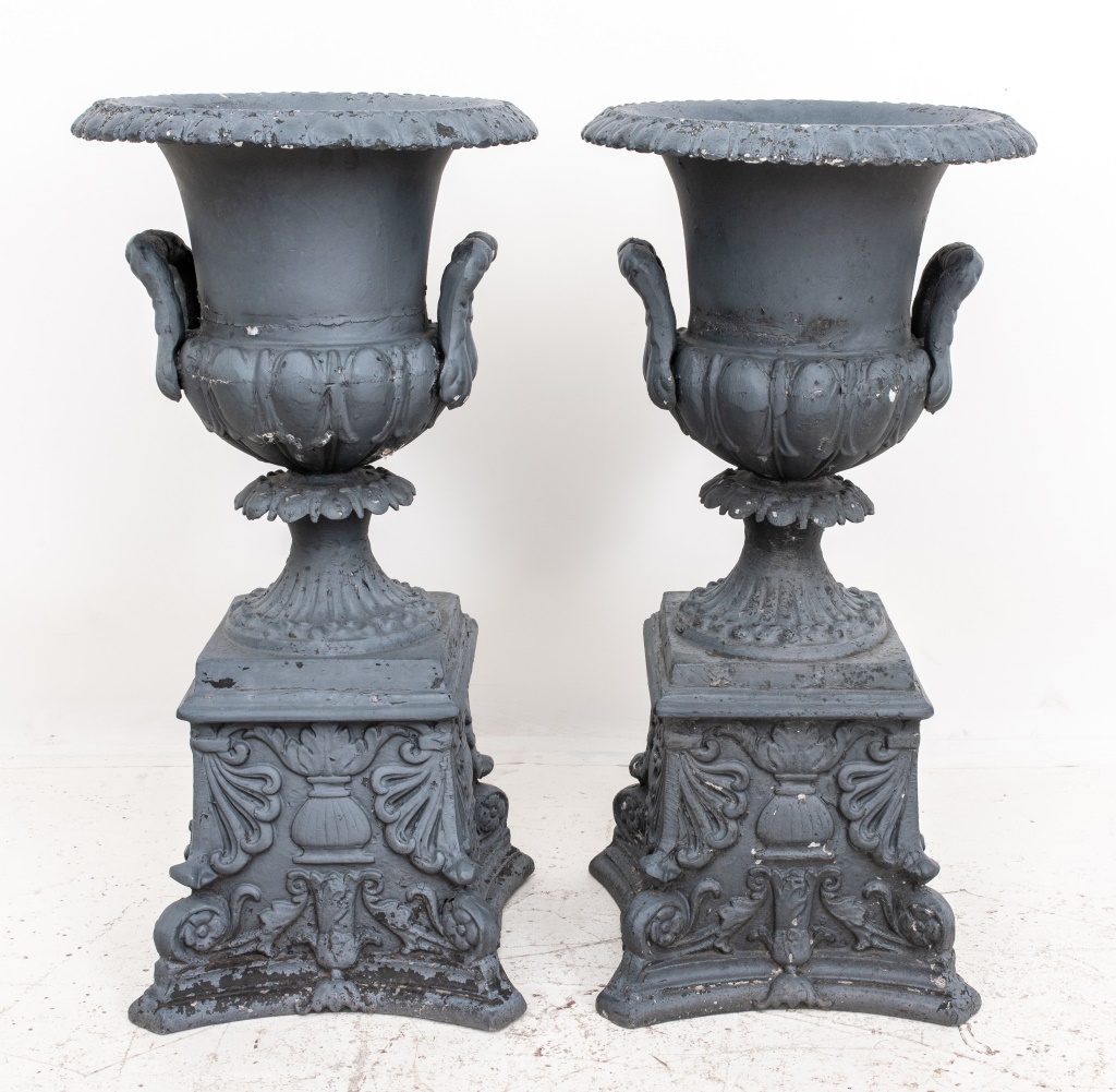 Appraisal: VICTORIAN STYLE GARDEN URNS PAIR Black-painted Victorian style painted cast-metal